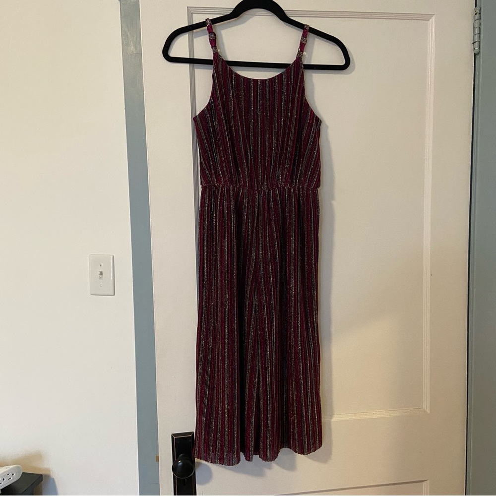 Cute girls jumpsuit in 9-10.  New with tags.
